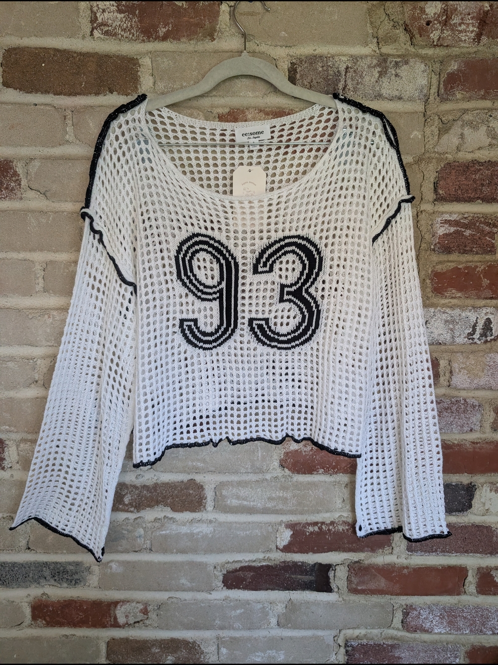 eesome White Open-Knit Long Sleeve Top with Black Trim and '93' Detail